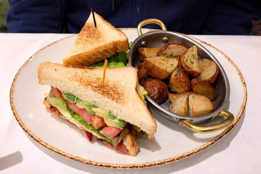 The Breakfast Sandwich at the Old Ebbitt Grill with Home Fries on the side.